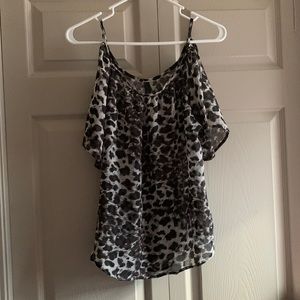 Women’s cheetah sheer shirt.